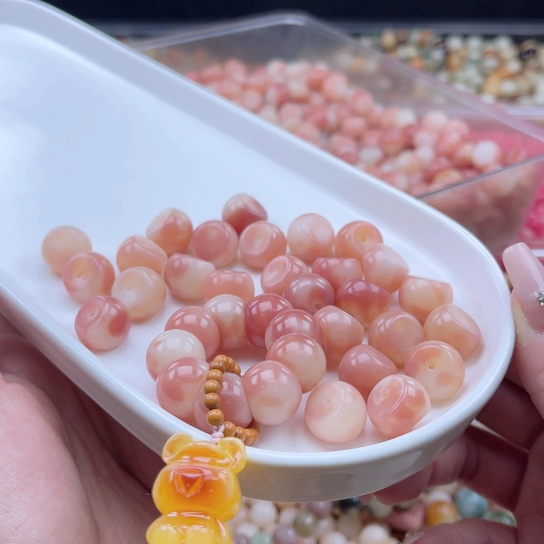 白玉菩提吊坠a14mm9颗。樱花粉瓜 厚切蒜瓣