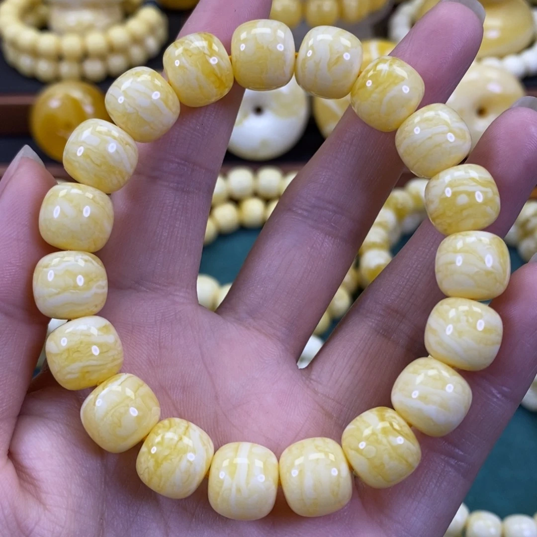 琥珀裸石未镶嵌橘白虎皮手串