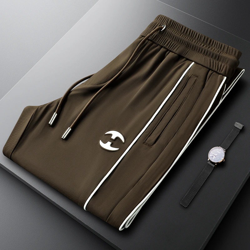 男士条纹拼接休闲裤夏季薄款时尚小直筒裤男士松紧腰弹力运动长裤