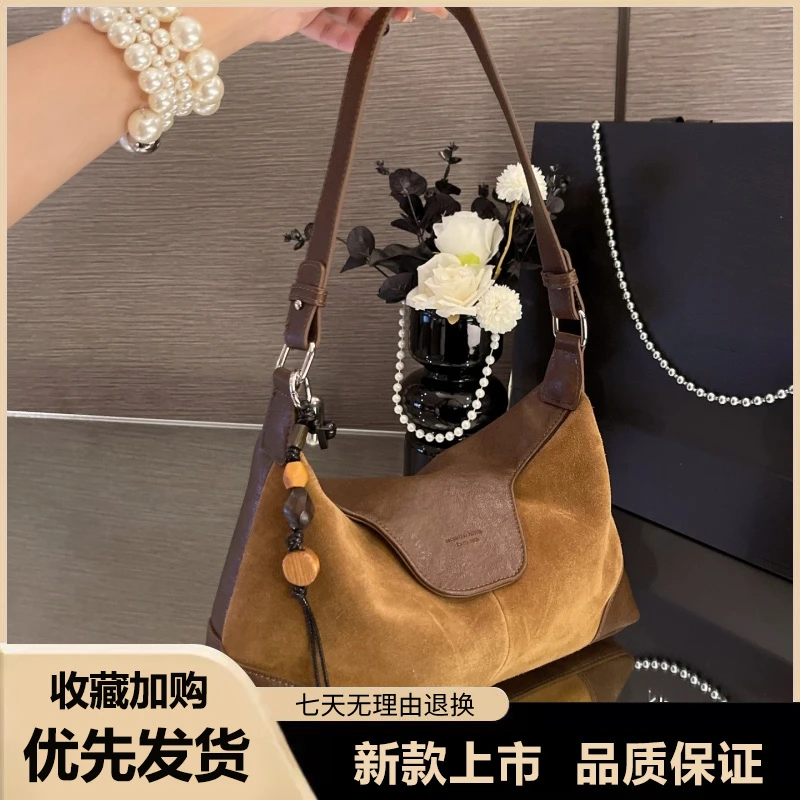 高级感复古绒面法棍包包女2025新款时尚气质腋下包百搭单肩斜挎包