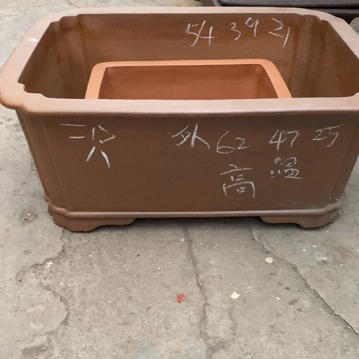 岭***术花盆紫砂只顾看手机的