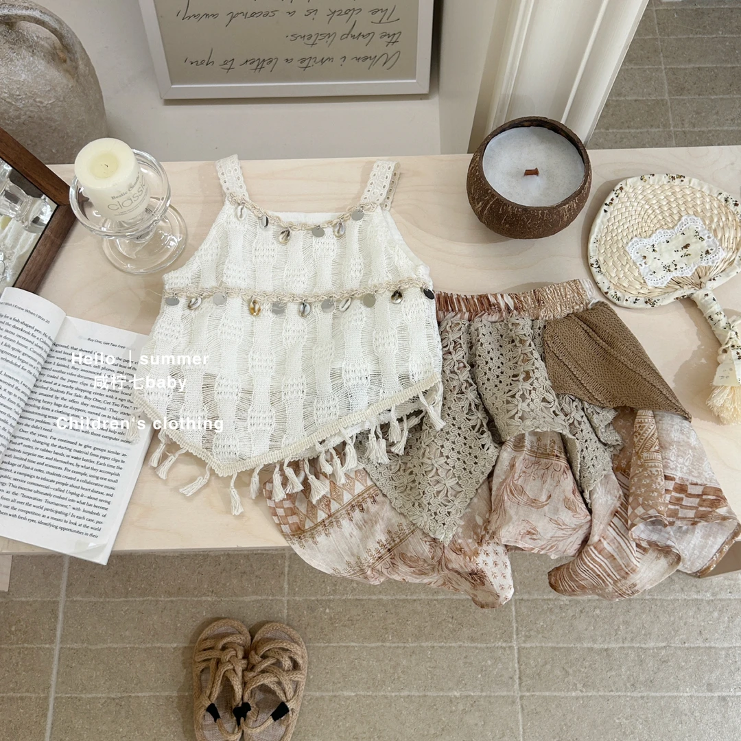 现【咸柠七】女童夏季套装2025波西米亚流苏镂空背心不规则半身裙
