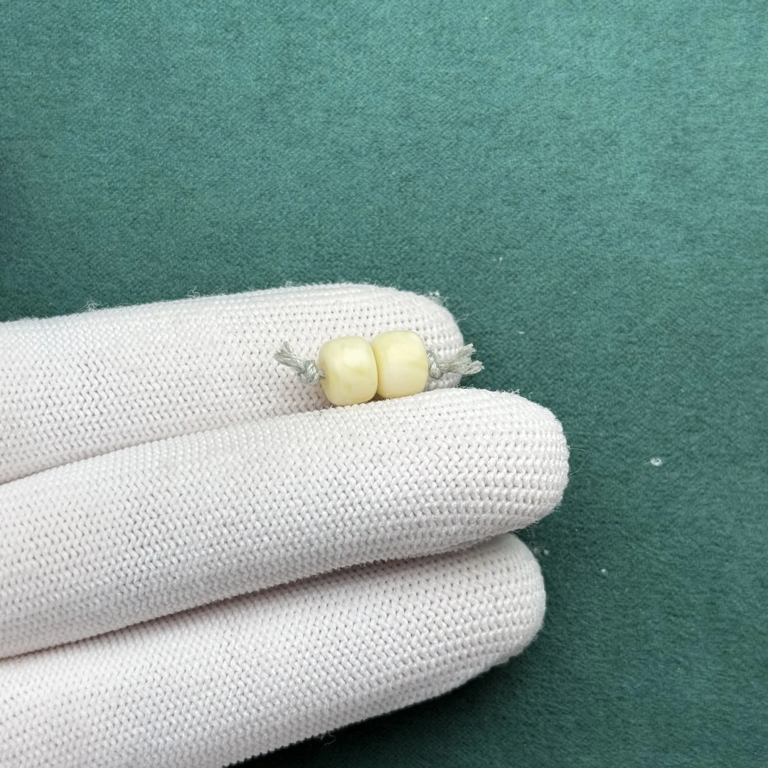 F3317天然原矿蜜蜡 对珠7.7*5.6mm 支持鉴定 假一罚十