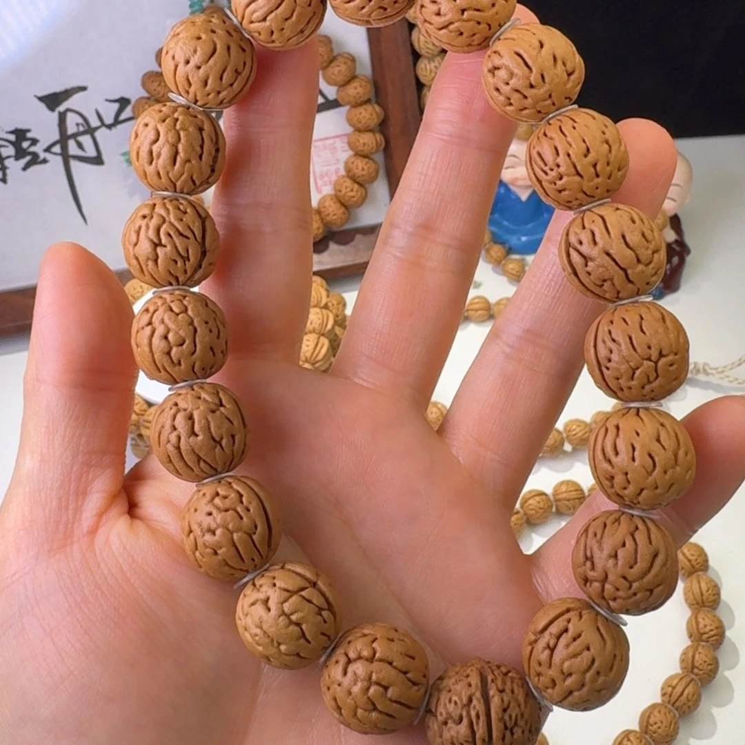 吴***谓桃核手串15➕大宽脐肌肉纹