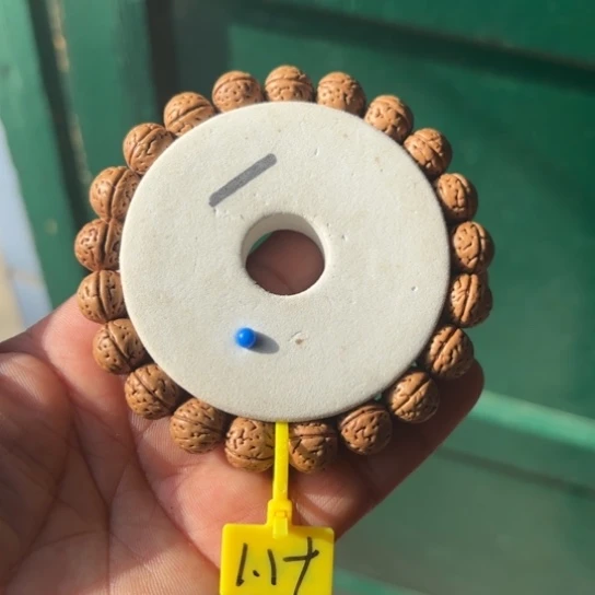 一***天木质野生桃核手串