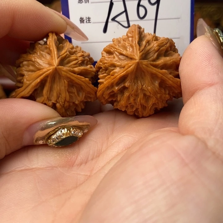 雨***子把件桃核全品三棱三棱