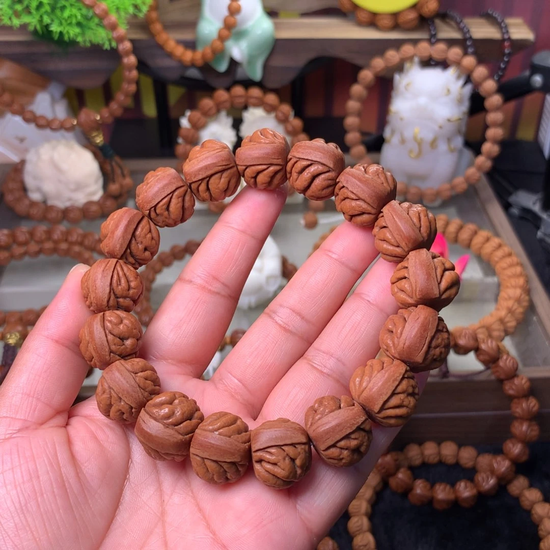 桃核吊坠豹子头手串18