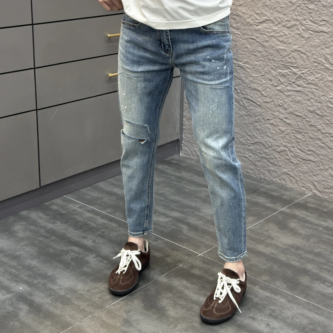 2025春季新款时尚休闲百搭净版破洞薄款九分牛仔裤519