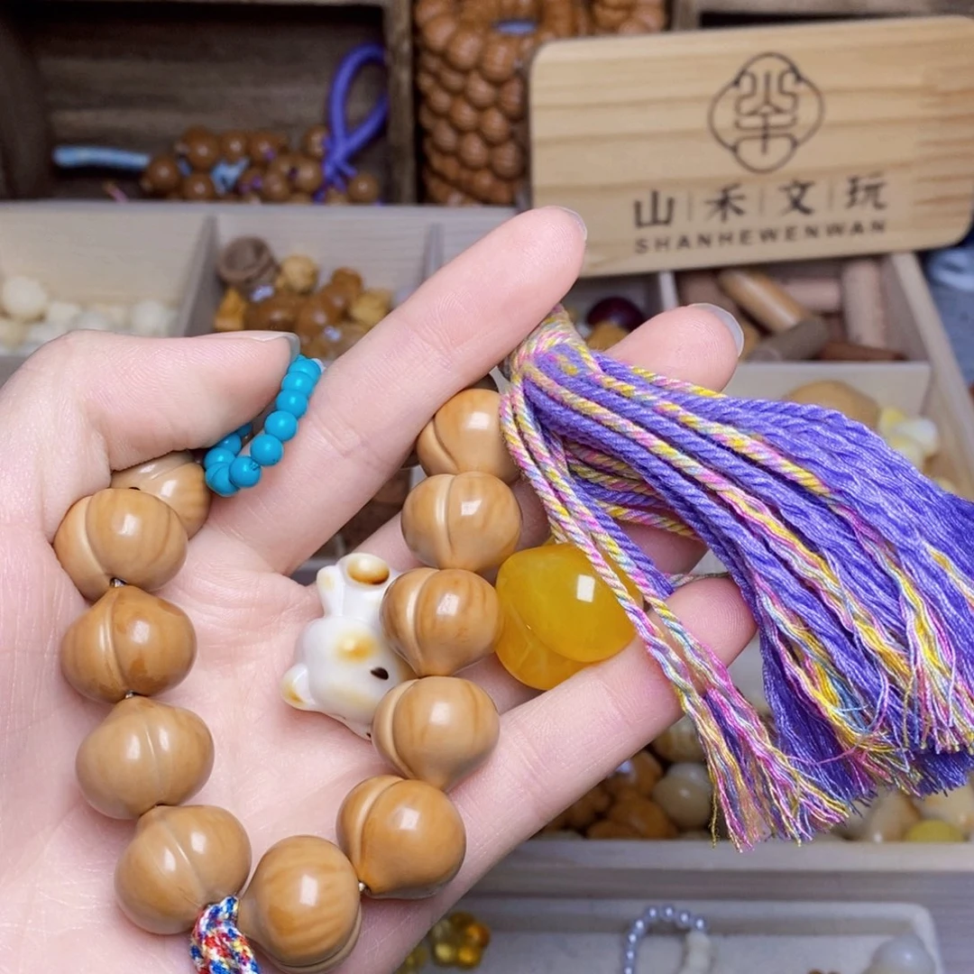 欧****吊坠猴头核桃十七柯基爱心 卡环 小熊 紫流苏