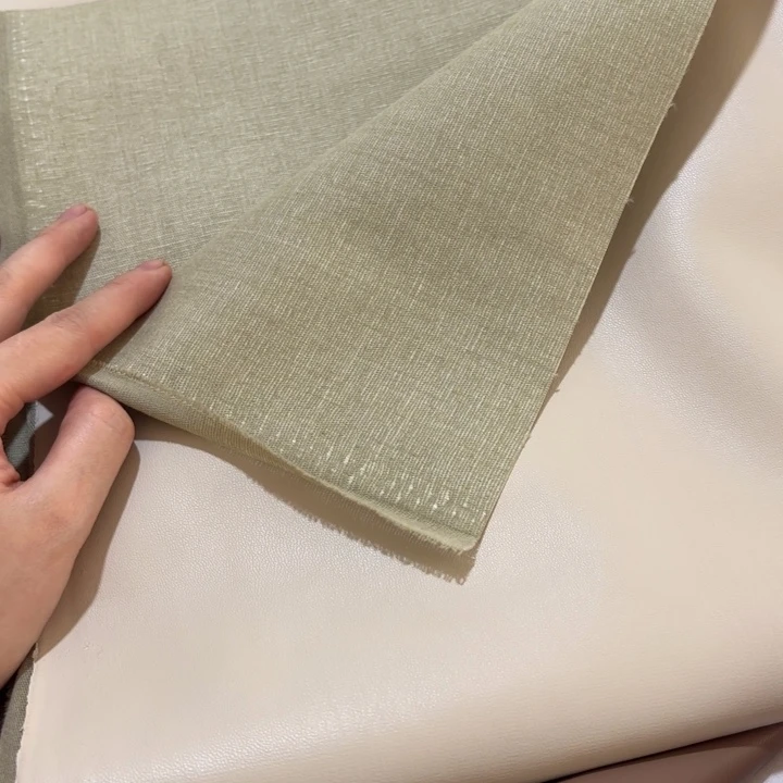 混纺米杏色布底皮1米。