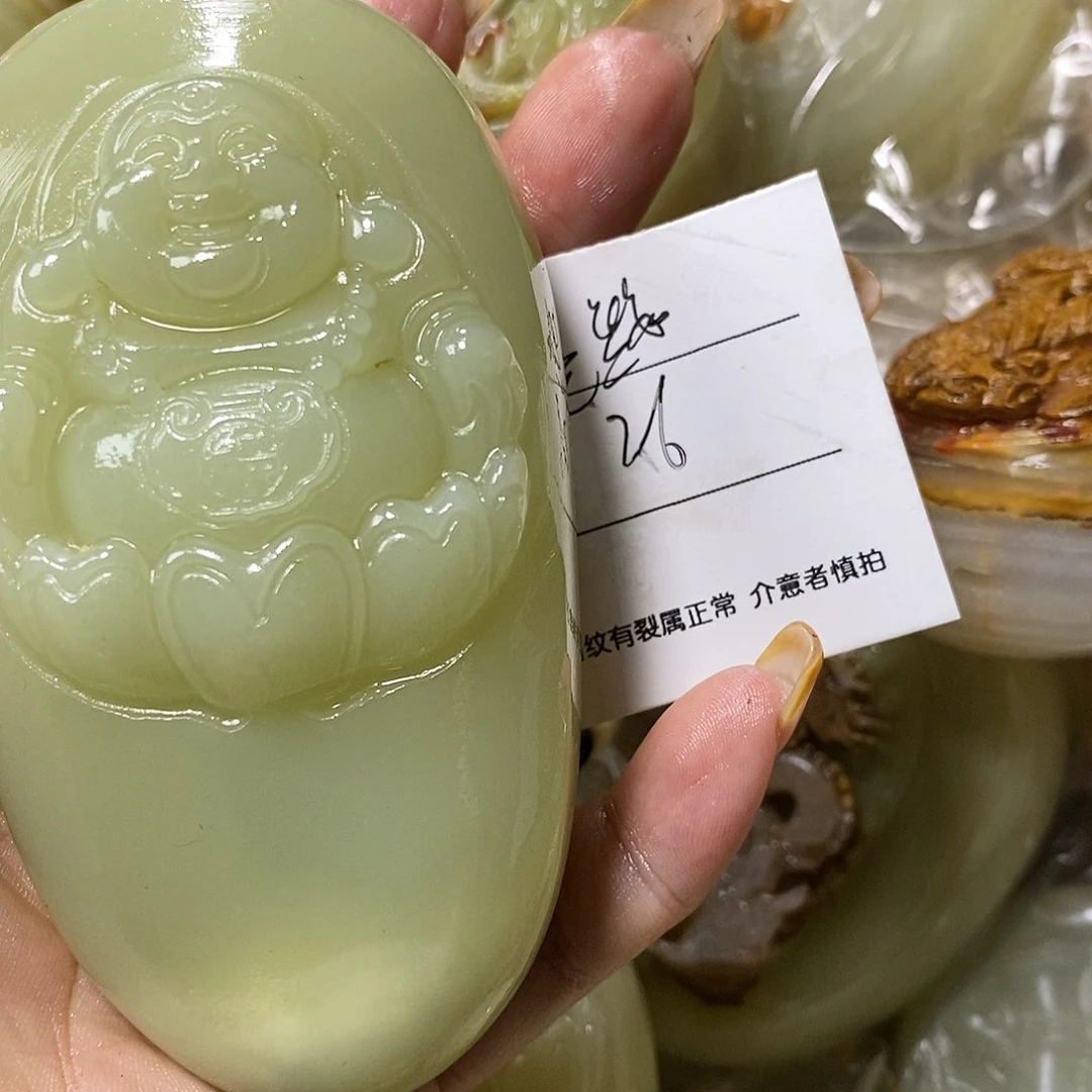 石材尘**梦古青石手把件