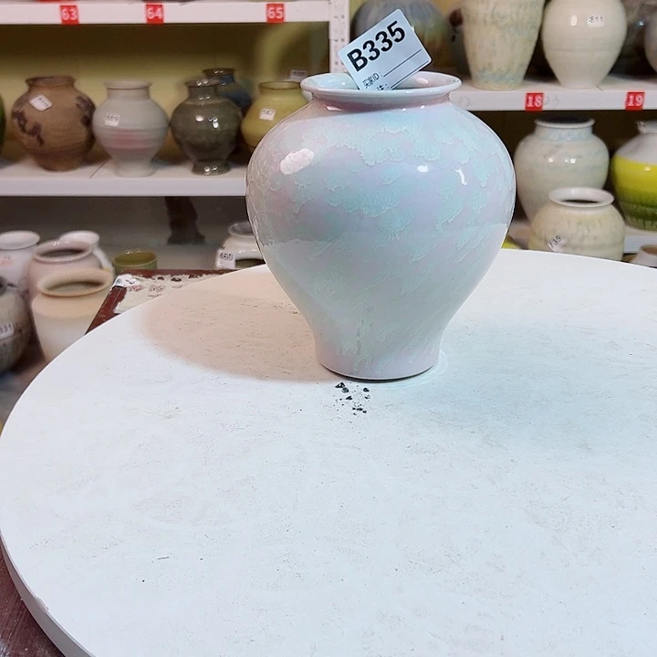 白泥花瓶高18口8。335