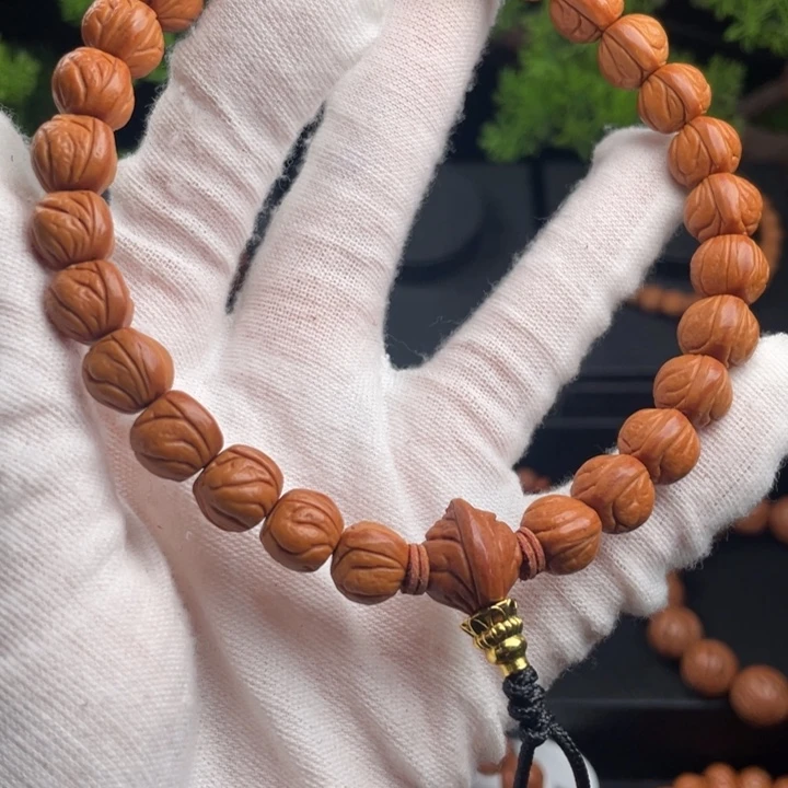 给***y桃核吊坠精品手持