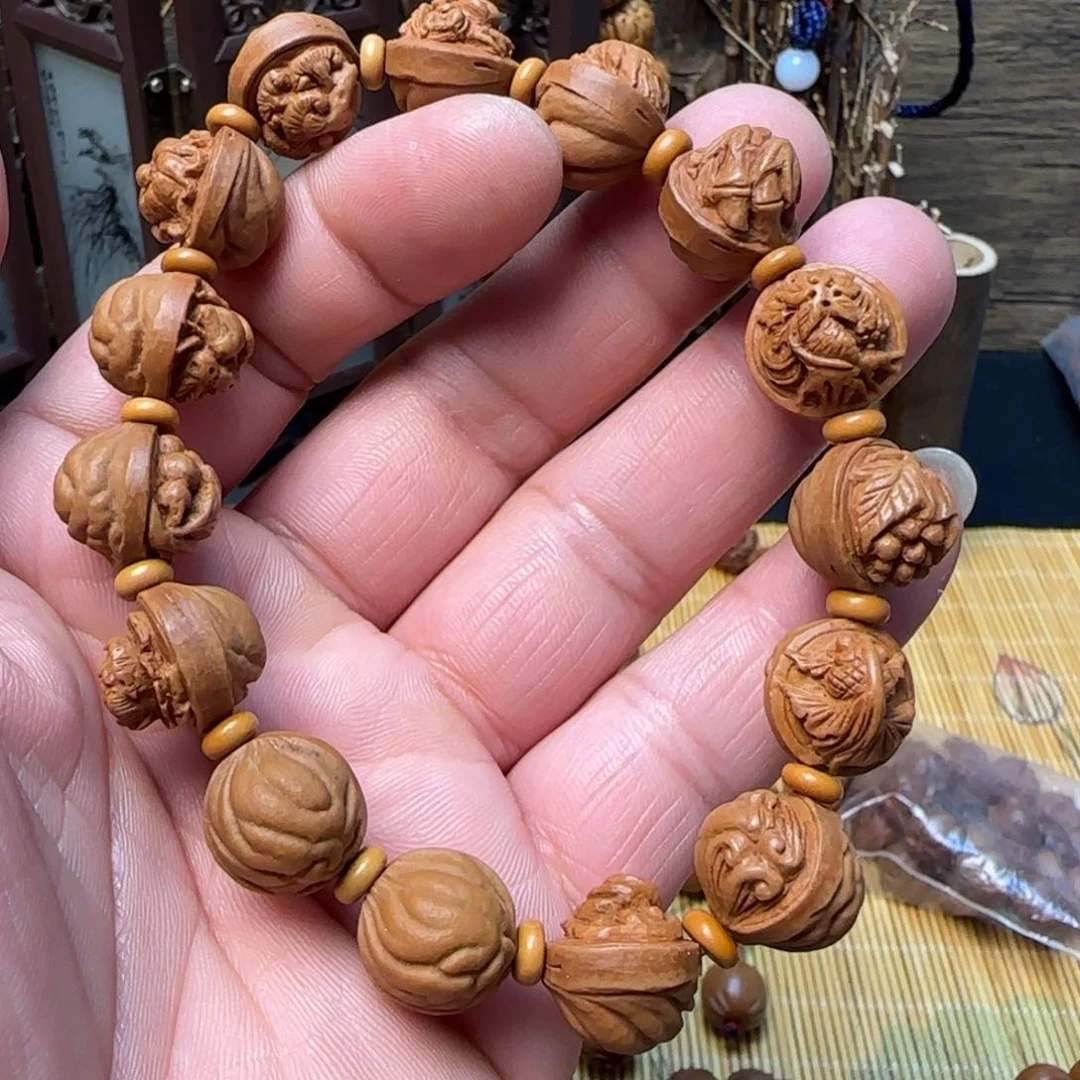 纯手工雕刻龙纹桃核多宝手串