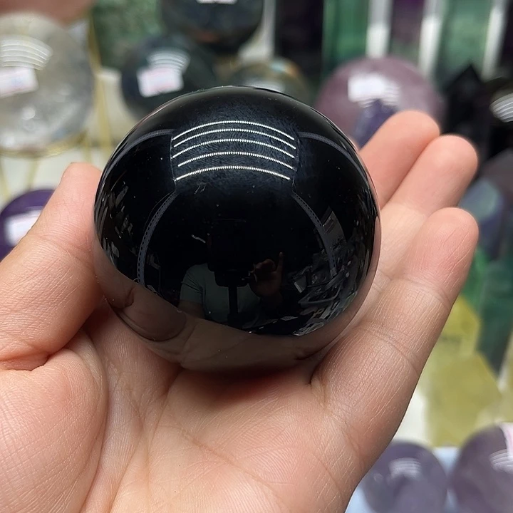 丽***丽未镶嵌黑曜岩珠宝奇石243克黑曜石球 瑕疵