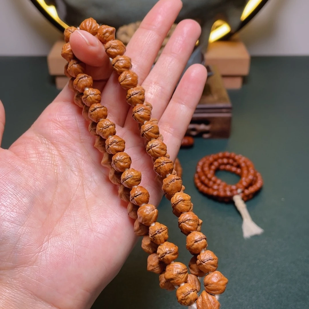 吊坠柏香籽/百香籽福利红牙手持