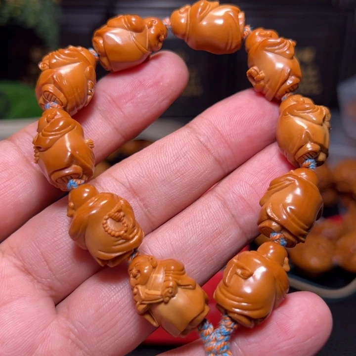 归***宝橄榄核手串自在弥勒