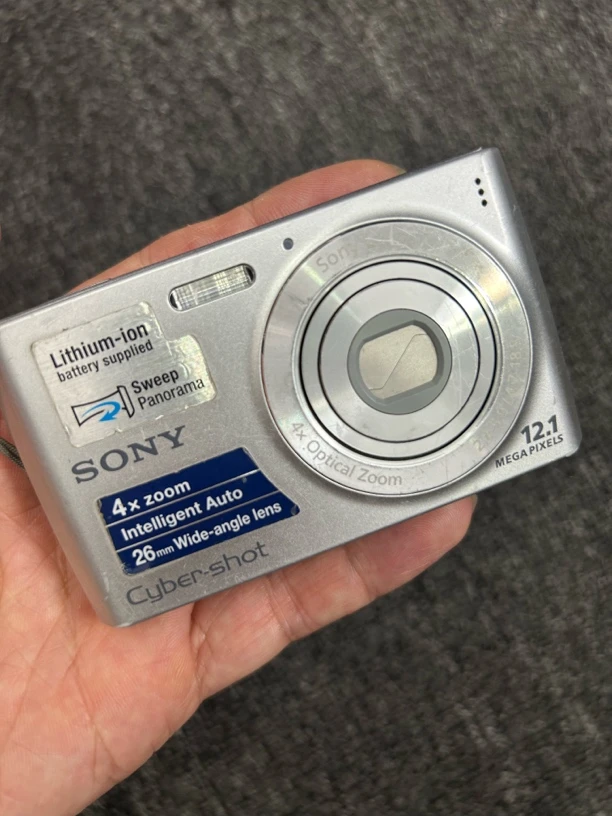 9新 Sony/索尼 W510ccd相机原装机银色电池盖松用贴纸贴上