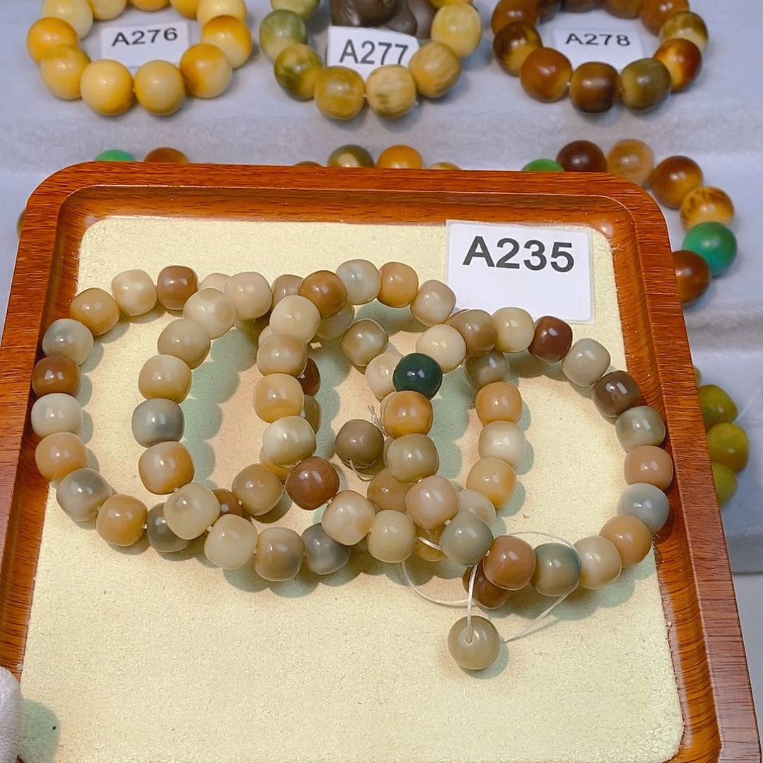 菩提根/象牙果手串花皮桶珠12mm（随机发一）