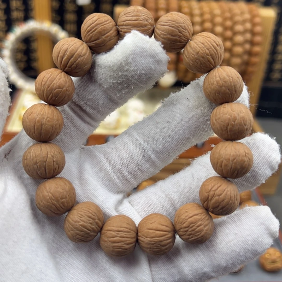 吊坠猴头核桃凤羽