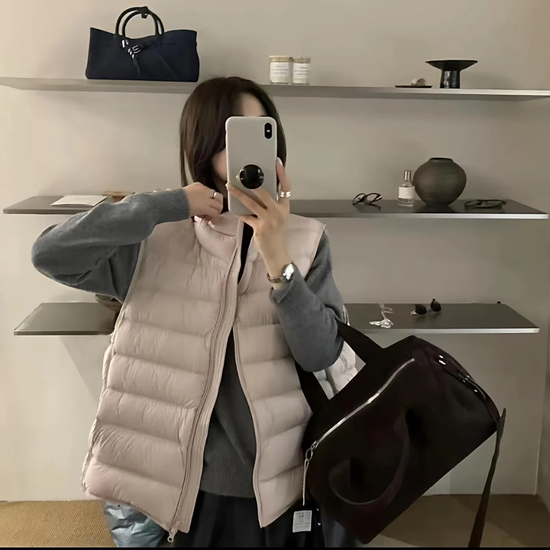 黄色排骨羽绒马甲女2025新款韩版简约小个子宽松90白鸭绒背心外套