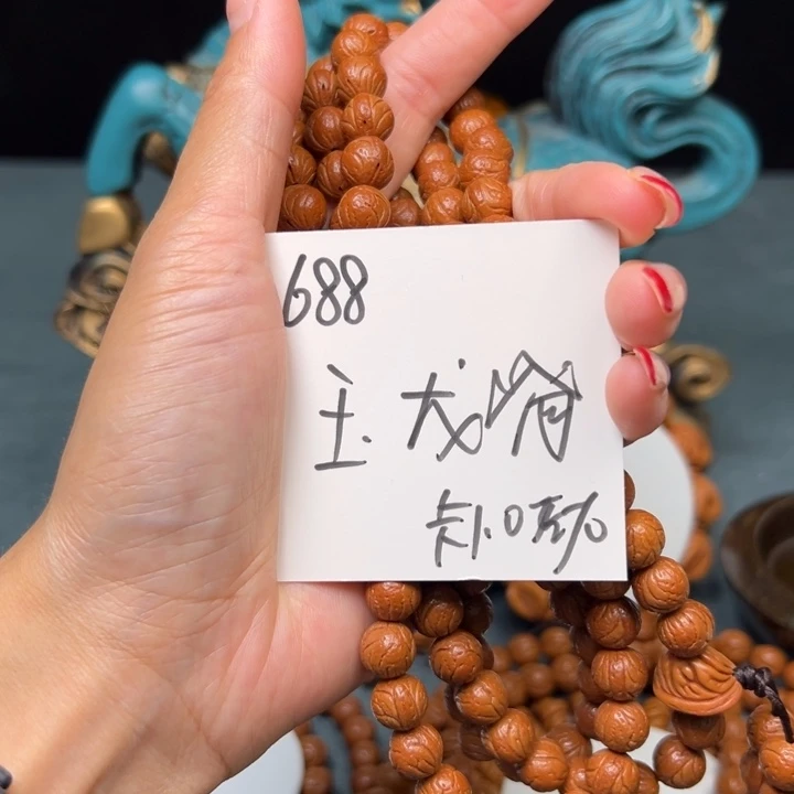 姜***群桃核吊坠秦岭野生龙纹桃核