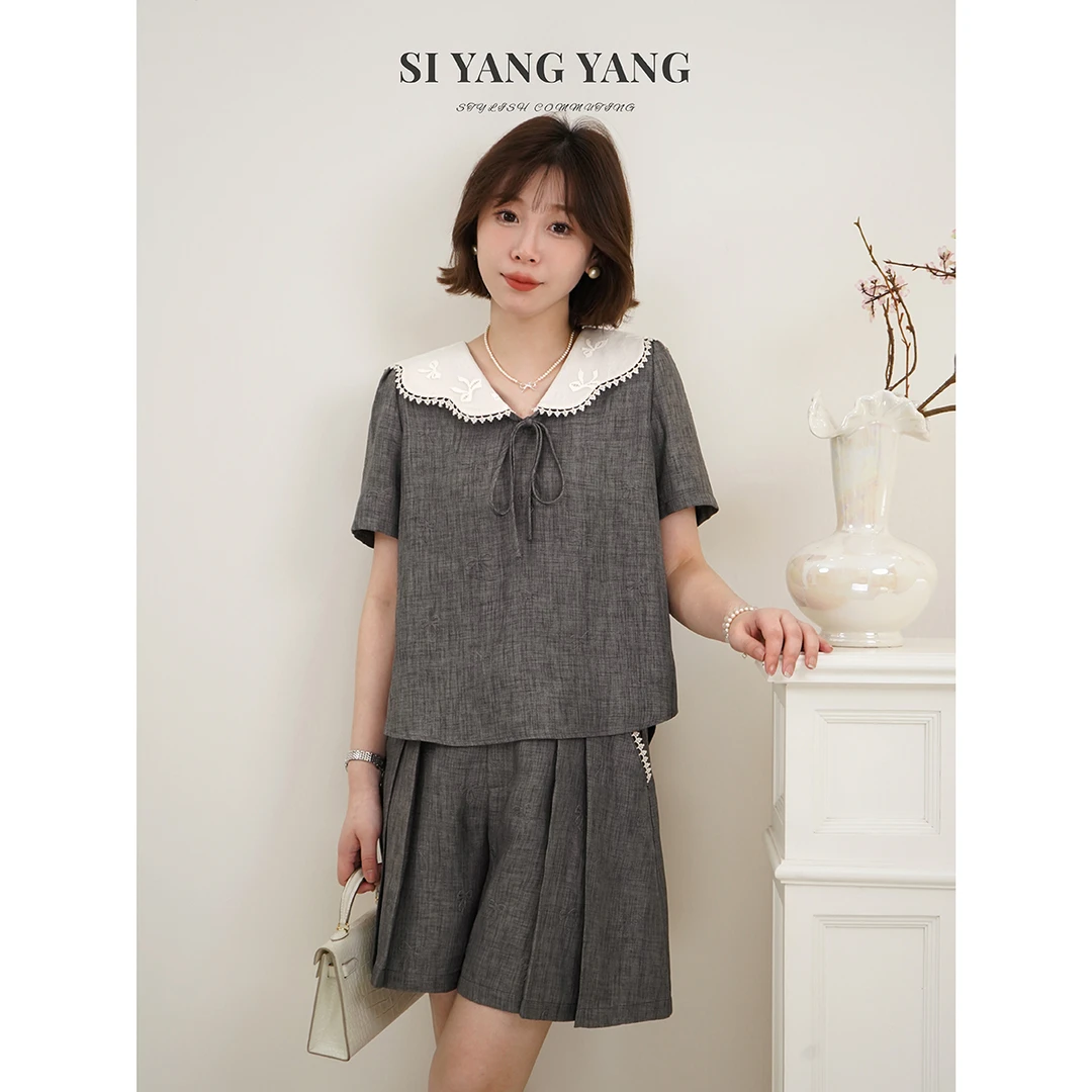 SIYANG蝴蝶结压花新款柔软舒适减龄通勤短裤套装TZ504A053SYY