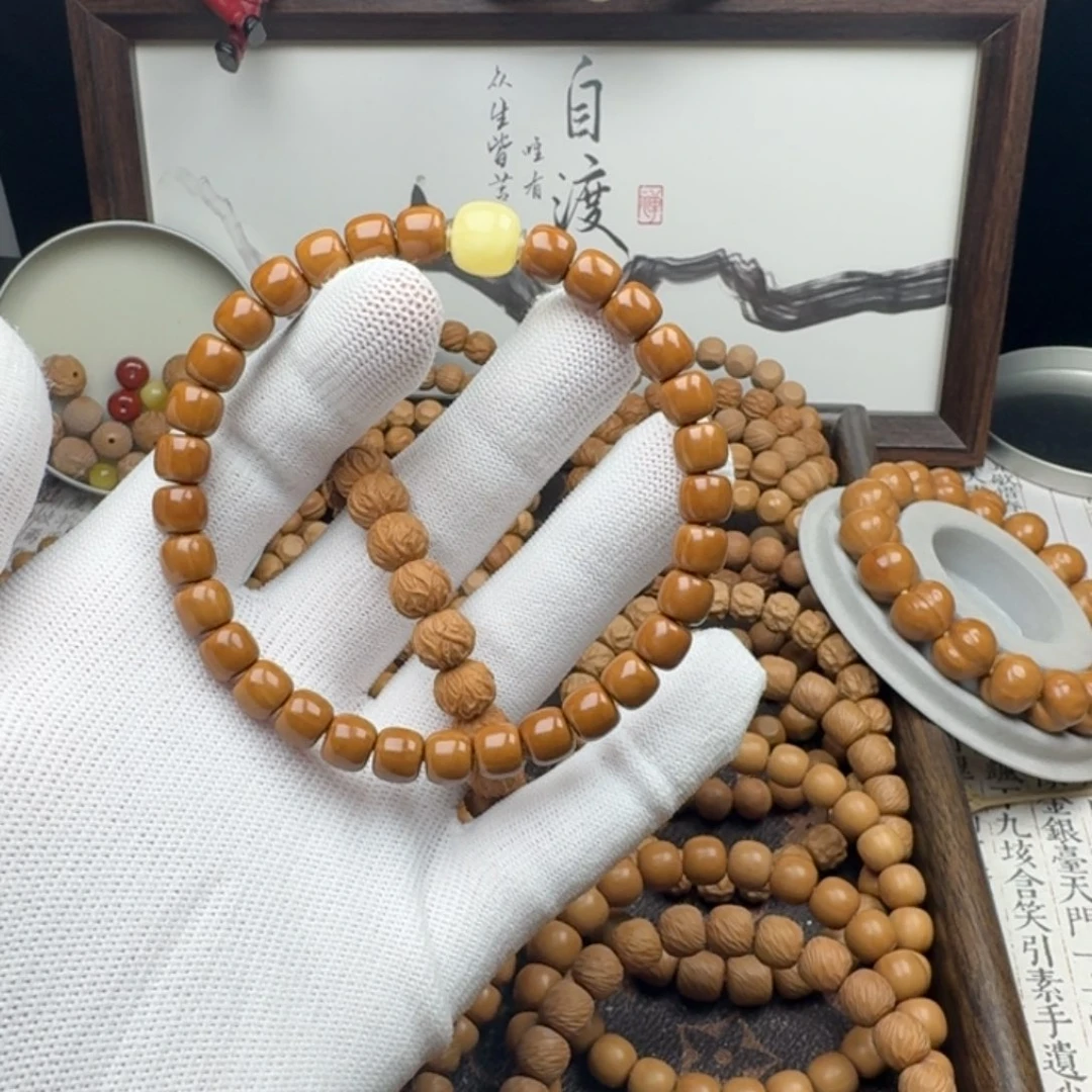 锁***芯猴头核桃手串亮面道珠