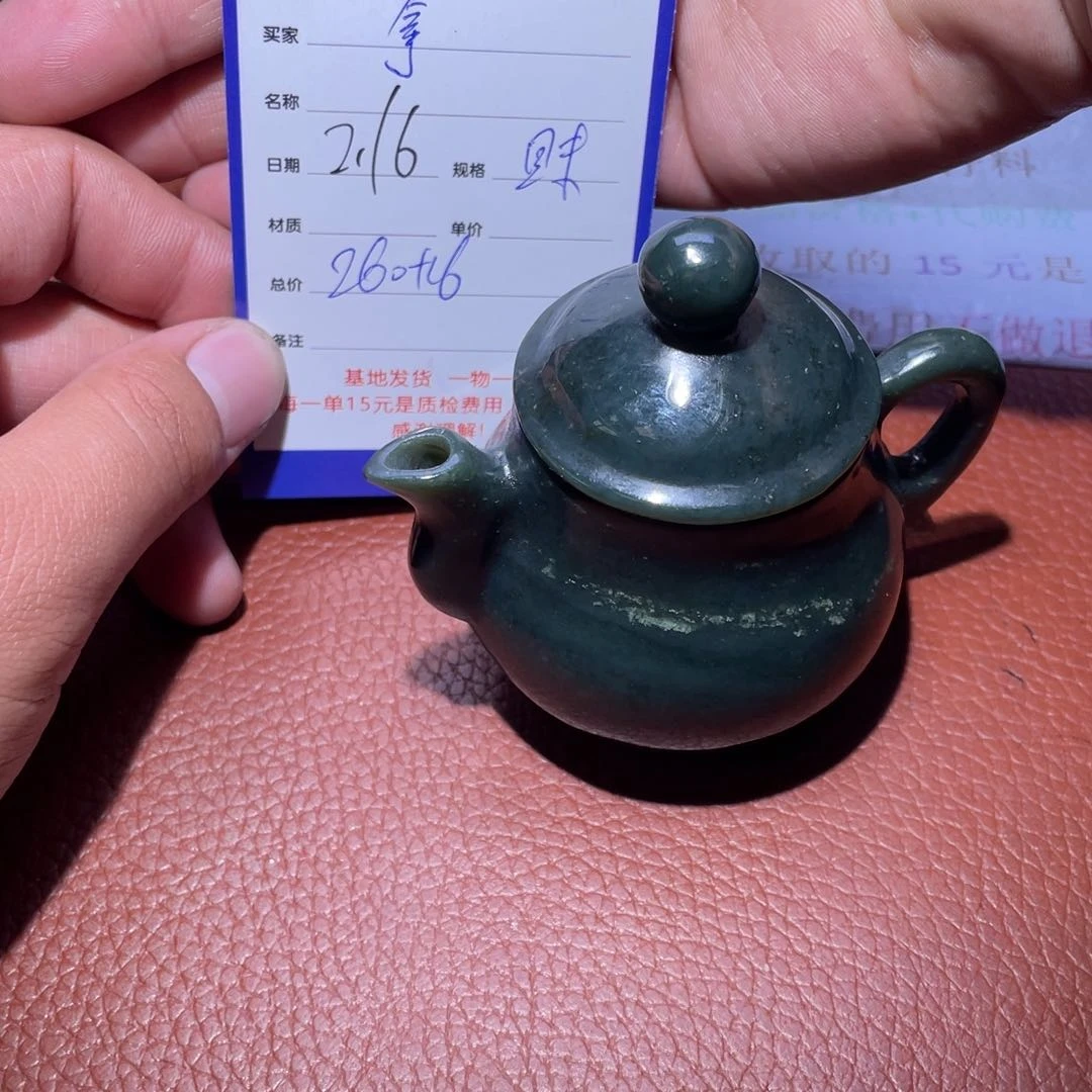 和田玉摆件未镶嵌拿**你