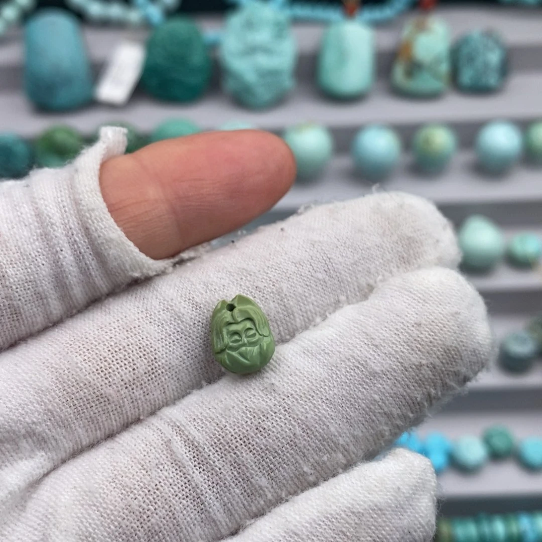 未镶嵌绿松石佛头