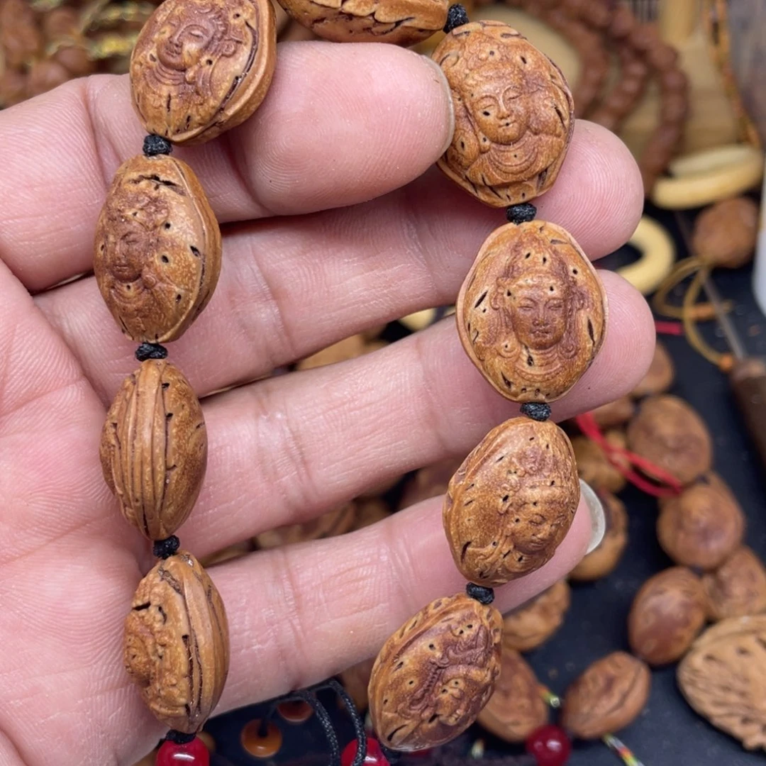 桃核雕刻观音手串