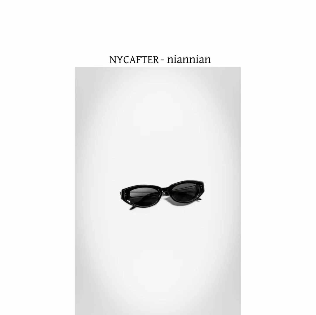 椭圆金属镂空墨镜黑色猫眼太阳镜搭配T恤sx2065