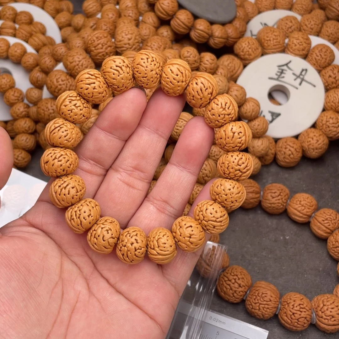 最***￴桃核手串树王纽扣闪48