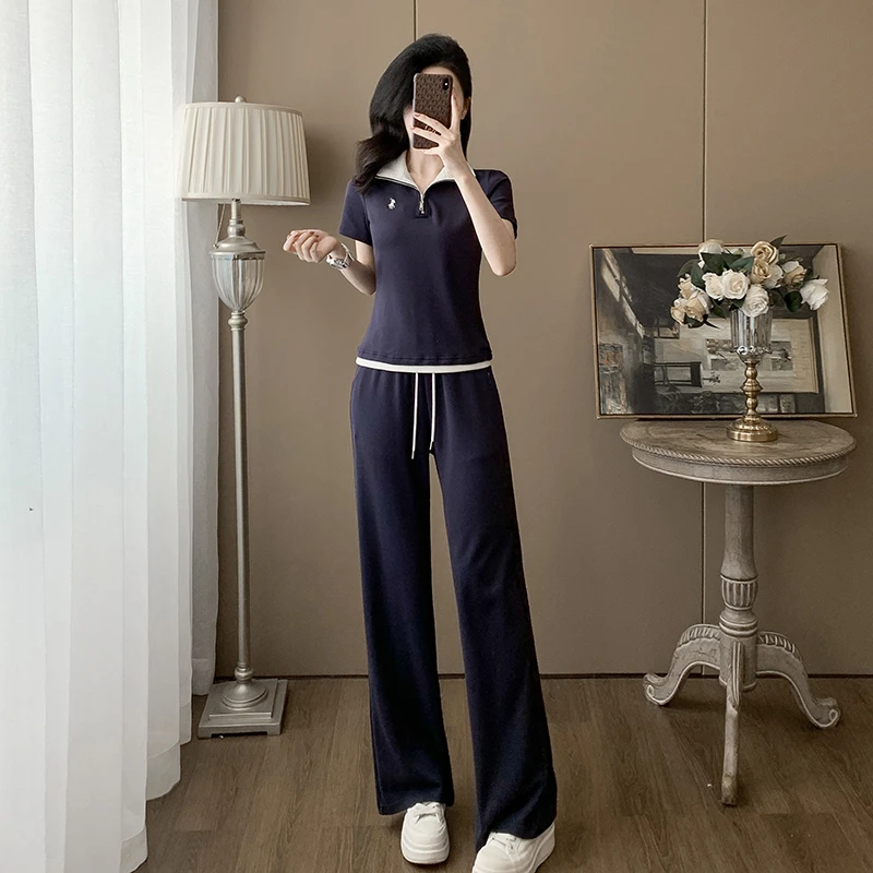 时尚休闲风套装女春夏季2025新款显瘦假两件短袖上衣阔腿裤两件套