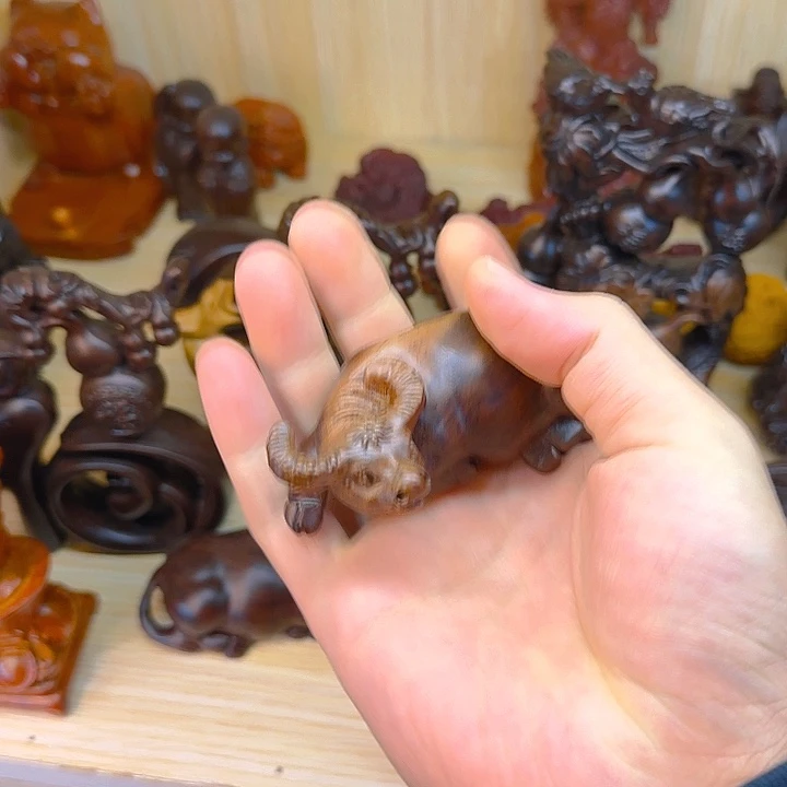 木黑檀木10双色卧牛一只