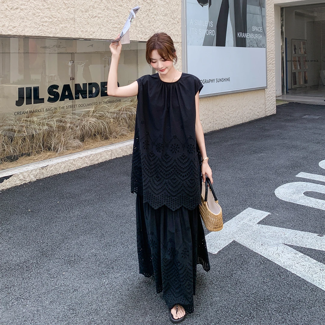黑色女神范高级感气质穿搭2025套装裙子镂空露背上衣半身裙两件套