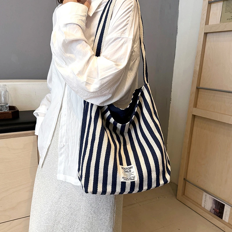 双面条纹包2025托特包文艺耐磨条纹慵懒风休闲小众单肩包网红韩版