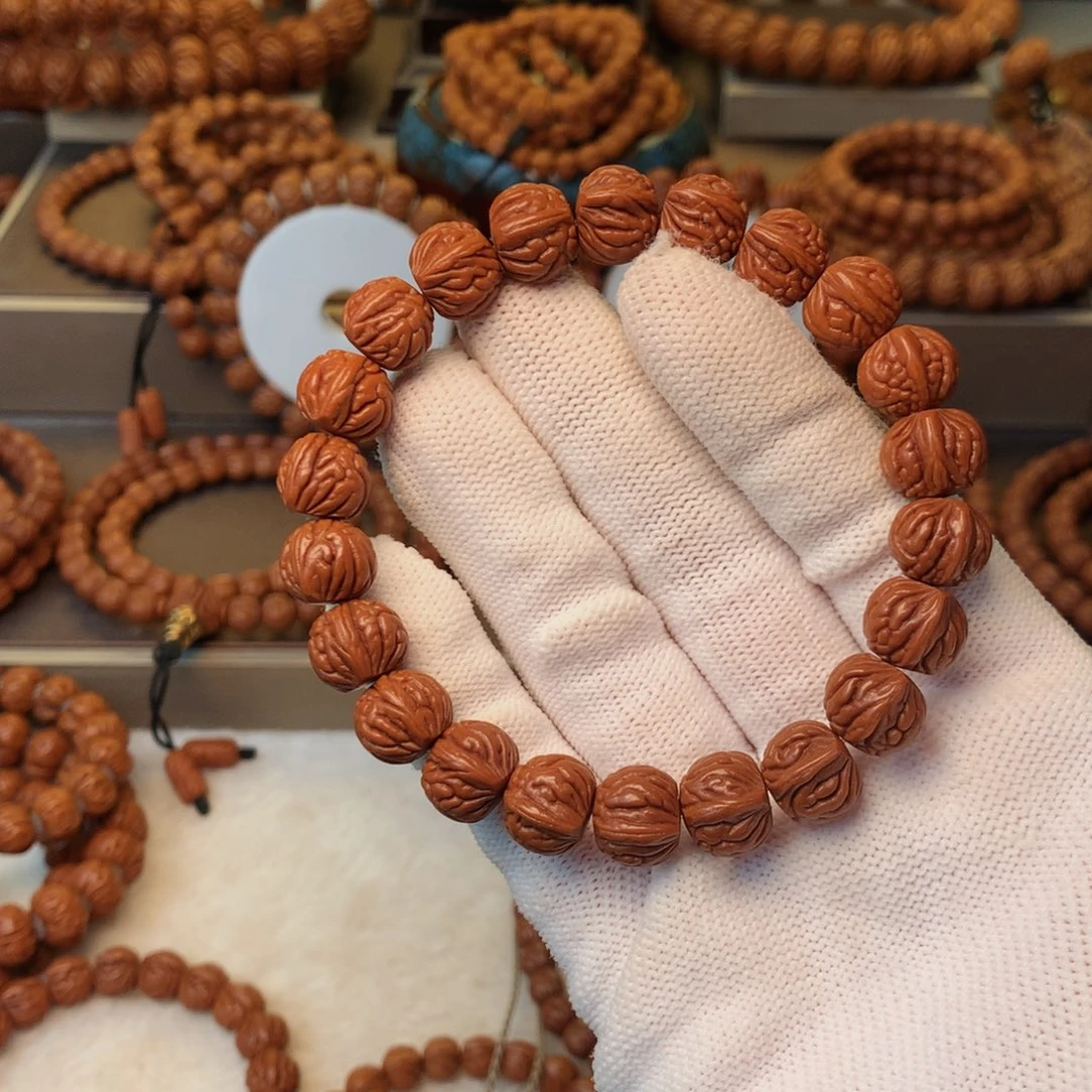 谢***凡桃核手串秦岭龙纹