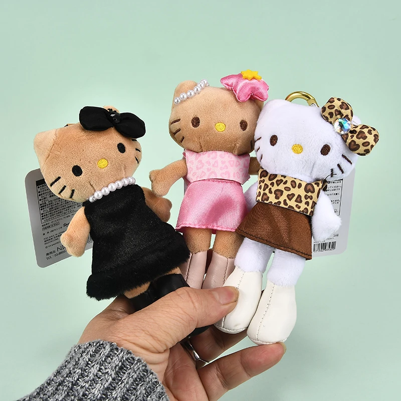 卡通长腿豹纹黑皮珍珠爱心扣Kit小尾巴公仔毛绒包包挂件