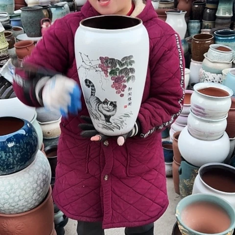 口17高33瑕疵盆子。