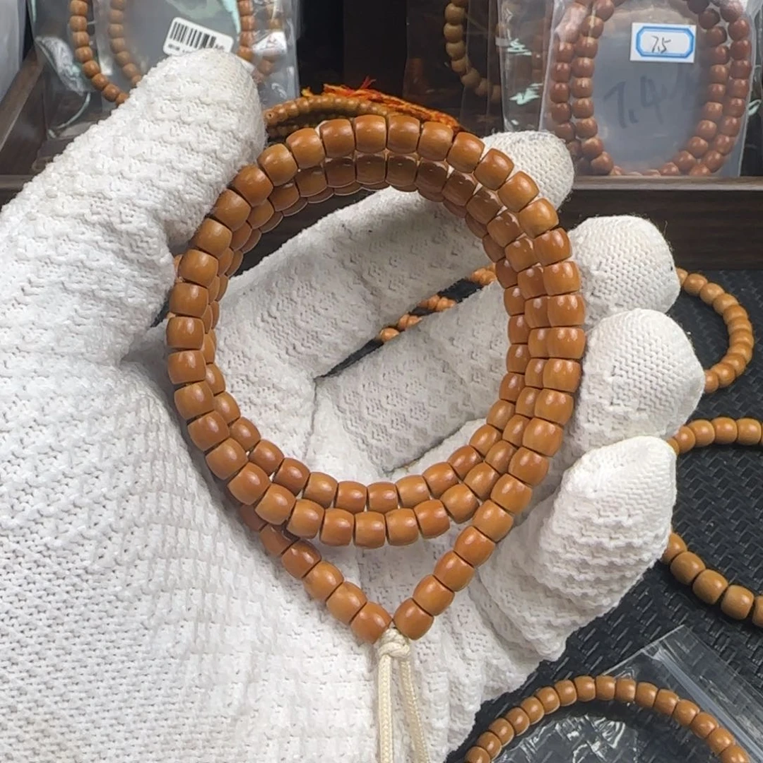 橄榄核吊坠T****n6.4mm老挝核尖直切110颗