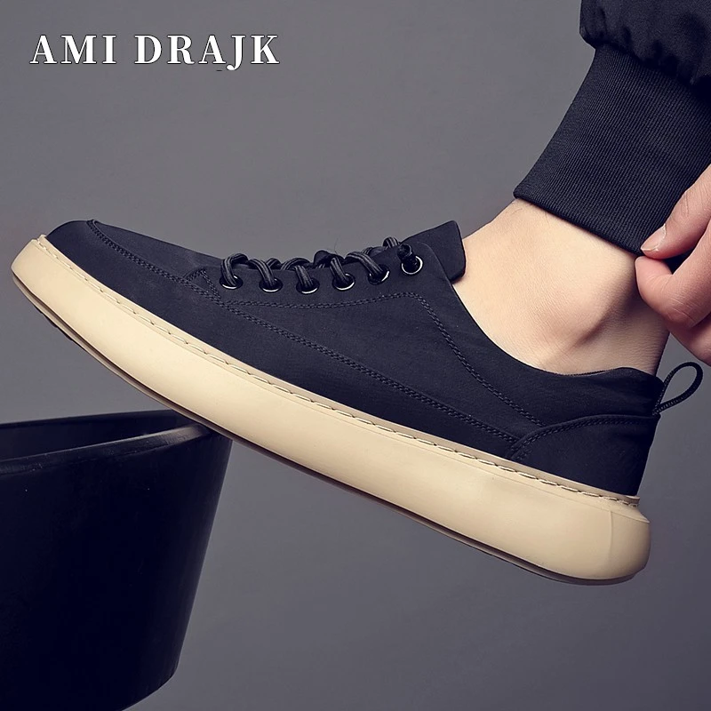 AMI DRAJK夏季新款帆布男鞋2025男款黑色休闲板鞋男士轻便百搭布