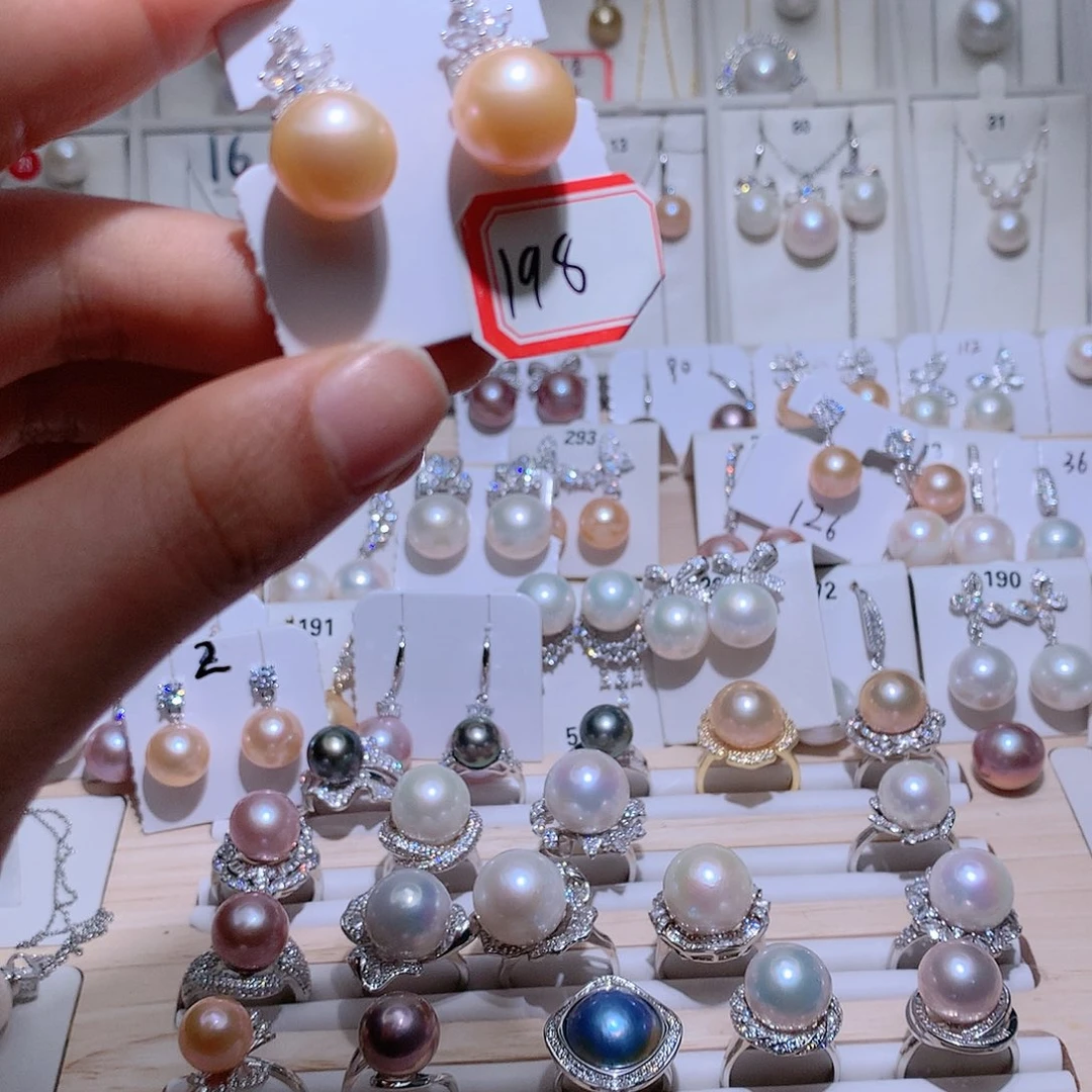 王****淡水珍珠耳饰银S925镶嵌