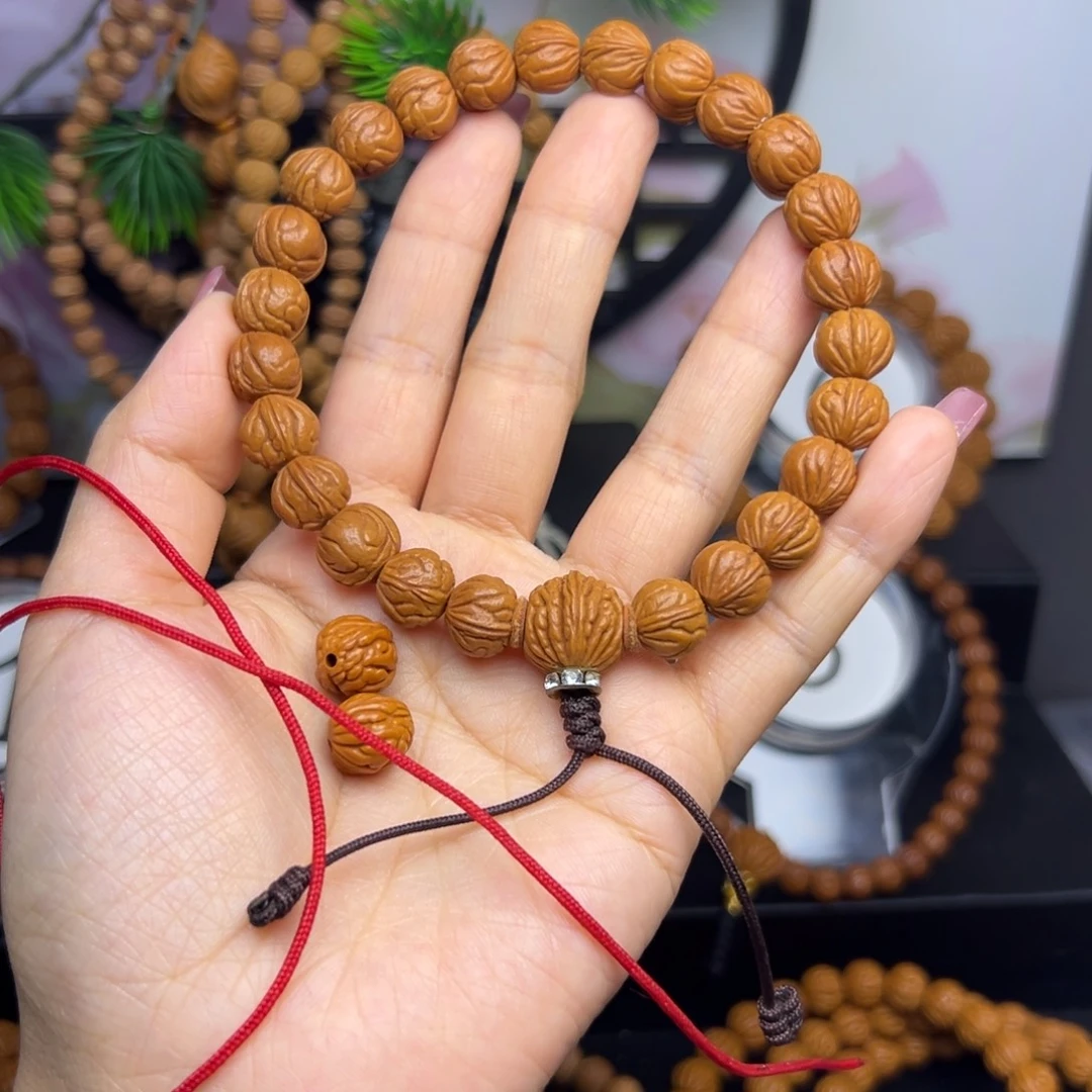 羊***妹桃核吊坠龙纹桃核手持