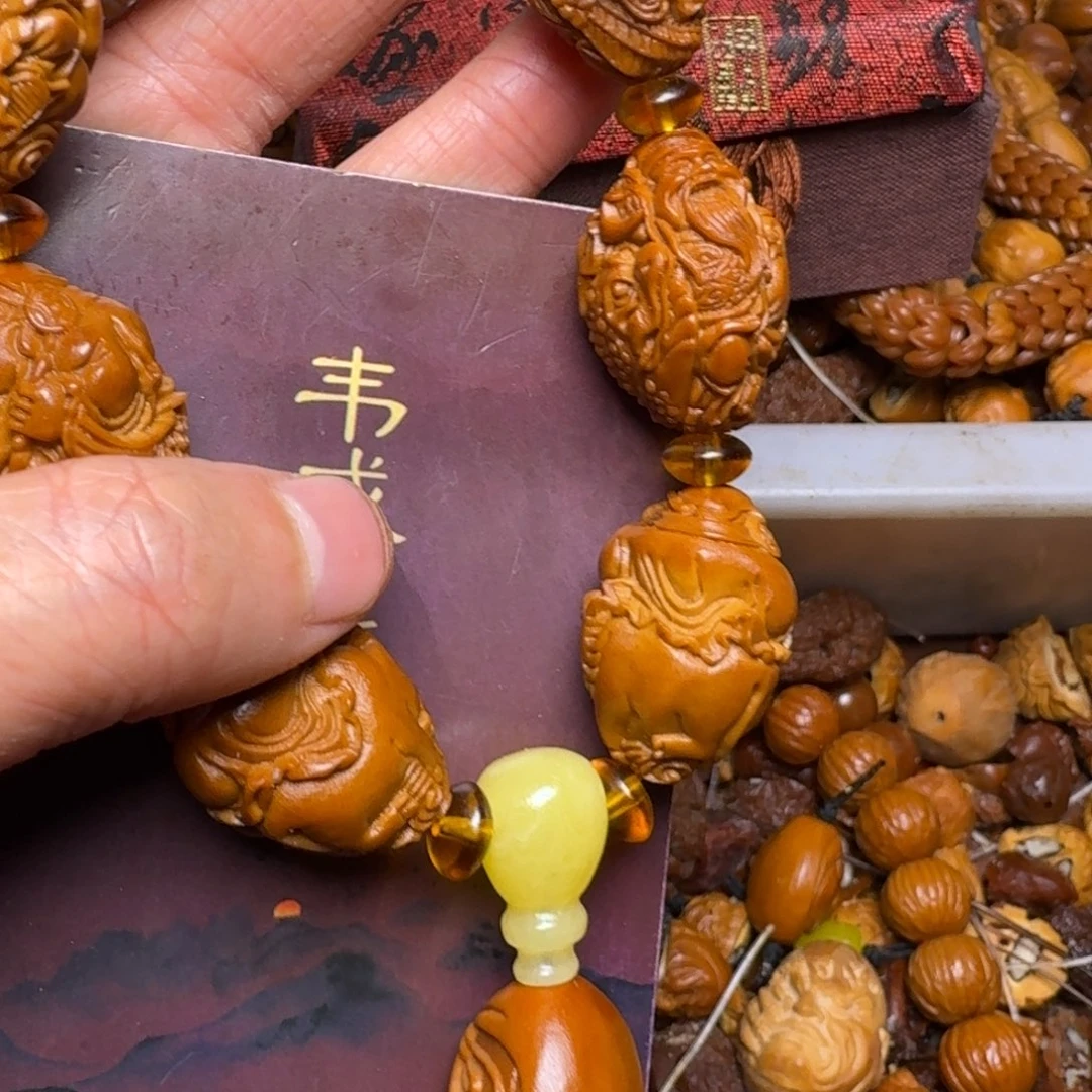 橄榄核吊坠你的电话