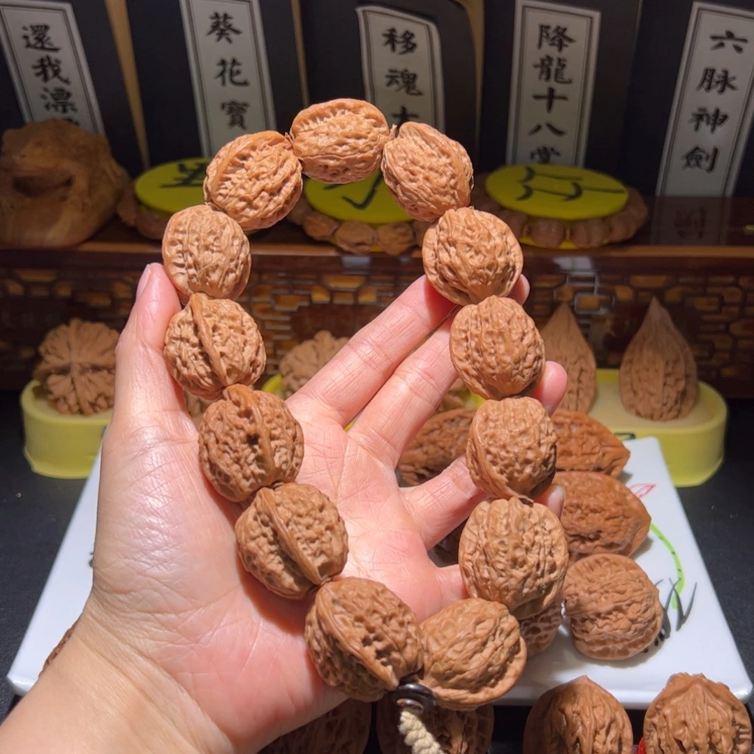 L***水文玩核桃把件火云石