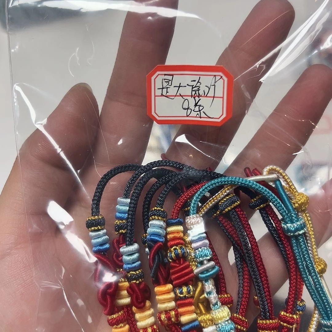 是***吖无纺布手工编织工艺手绳