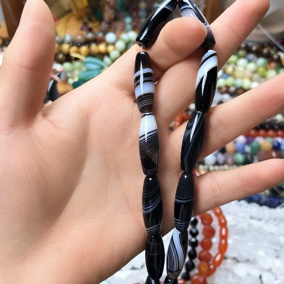 玛瑙/玉髓未镶嵌珠宝半成品10×30黑蚕丝玛天珠一条