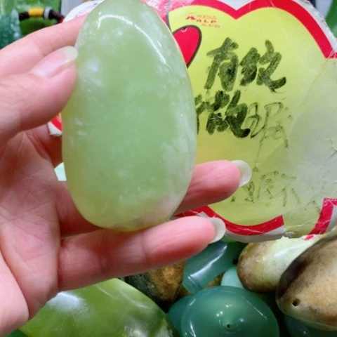 未镶嵌蛇纹石玉手把件