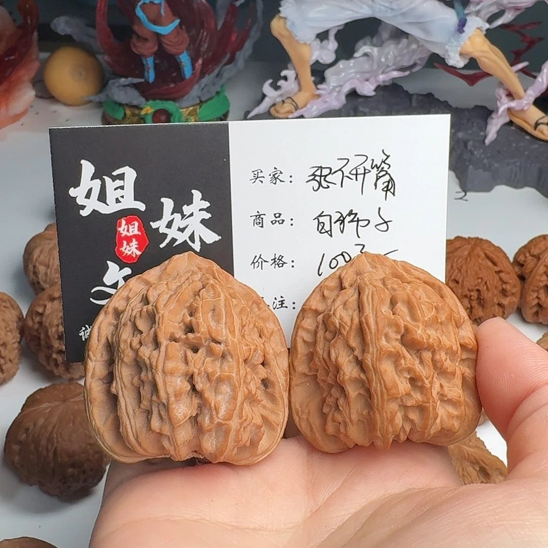 张***嘴吊坠桃核白狮子头